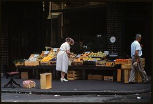 Woman shopping at outdoor market, Boston