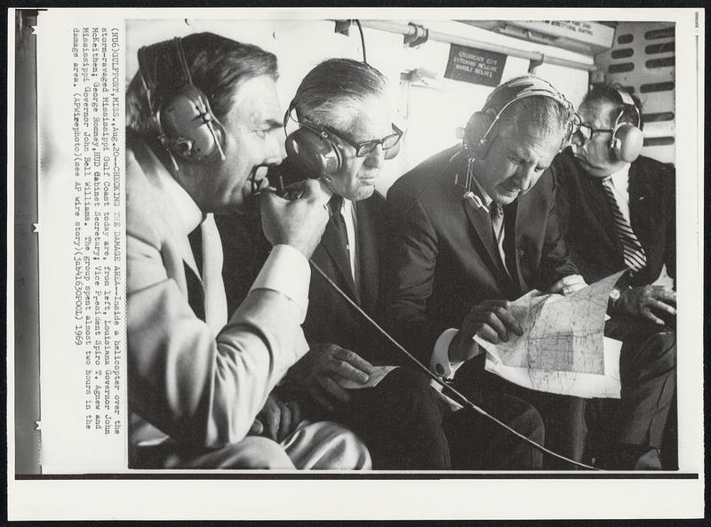 Gulfport, Miss. -- Checking The Damage Area -- Inside a helicopter over the storm-ravaged Mississippi Gulf Coast today are, from left, Louisiana Governor John McKeithen; George Romney, HUD Cabinet Secretary; Vice President Spiro T. Agnew and Mississippi Governor John Bell Williams. The group spent almost two hours in the damage area.