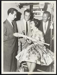 Miss is a Hit - Three members of the Dodgers baseball team – Sandy Koufax, Stan Williams and Ed Roebuck – drop in on actress Margie Regan on the set of “Michael Shayne” seen Friday night at 10 on Channels 4-6-10.Miss Regan co-stars as the series’ Lucy in this Friday’s episode “Strike Out.”