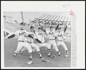 West Palm Beach, Fla. – Pitchers Get Kinks Out – Milwaukee Braves pitchers doing stretching exercises during spring training in new stadium. Left to right, Arnold Umbach, Wade Blasingame, Jim Britton, Tony Cloninger and Bob Hendley.