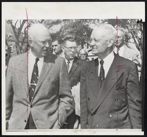 Official Parting of President Eisenhower and his chief assistant, Sherman Adams, as the latter left Newport yesterday for Washington to announce he was quitting. The chief executive, knowing then Adams was out, accompanied him to helicopter. Press Secretary James Hagerty is in background.