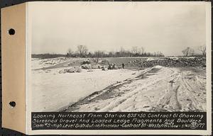 Contract No. 80, High Level Distribution Reservoir, Weston, looking northeast from Sta. 895+50 Contract 81 showing screened gravel and loaded ledge fragments and boulders, dam 5, high level distribution reservoir, Weston, Mass., Jan. 5, 1940