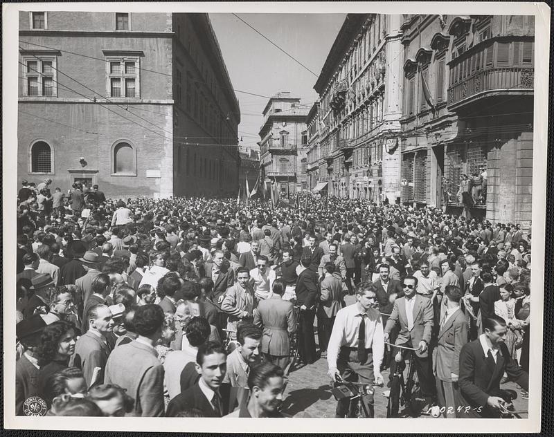 Hordes of overjoyed civilians turned out to cheer Americans in the Palazzo Venezia