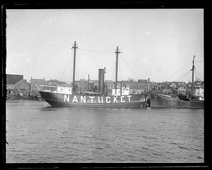 Lightship Nantucket next to an unidentified ship