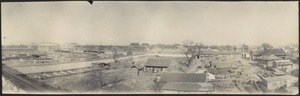 Distant view of Foreign Legation quarter; Chinese homes in foreground