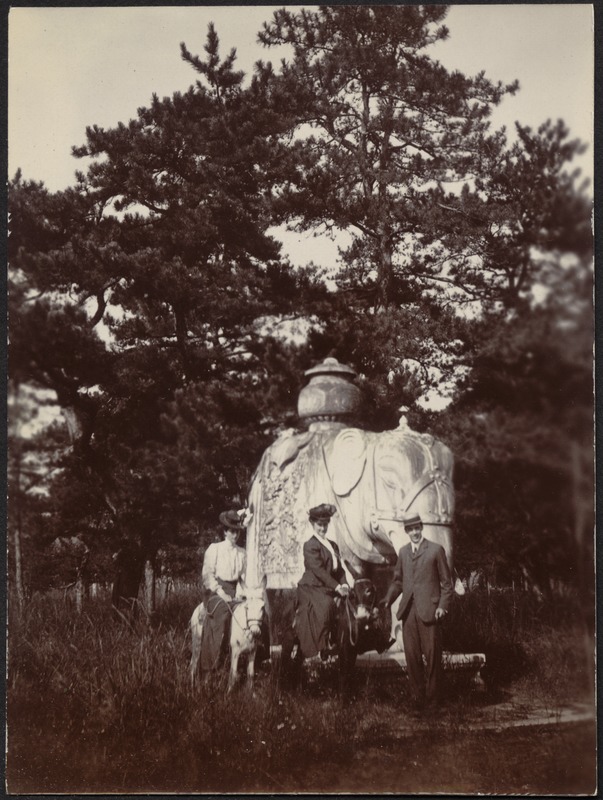 Mary Pierce Hammond (cousin of Laura) and Laura Conger Buchan (daughter of U.S. Minister to China, Edwin H. Conger) on burros near stone elephant shrine