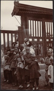 Children gathered in front of gate at the Winter Palace