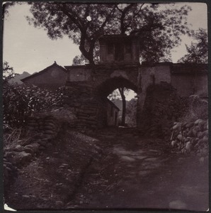 Stone gateway into village