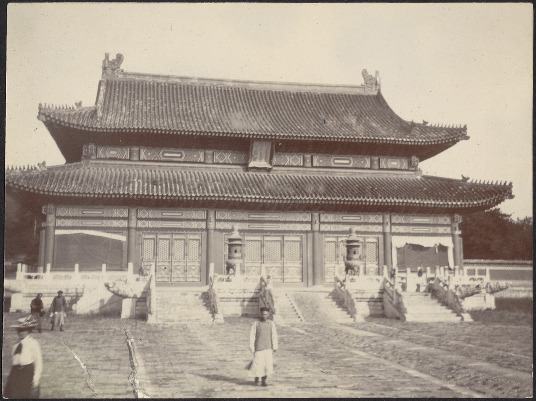Chinese man posing in front of Temple, possibly the Forbidden City