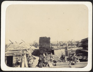 Construction of new Legation; workers in foreground