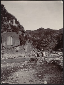 Ruins at Tan-Tsing Chio; Conger family and guide walking on rocks