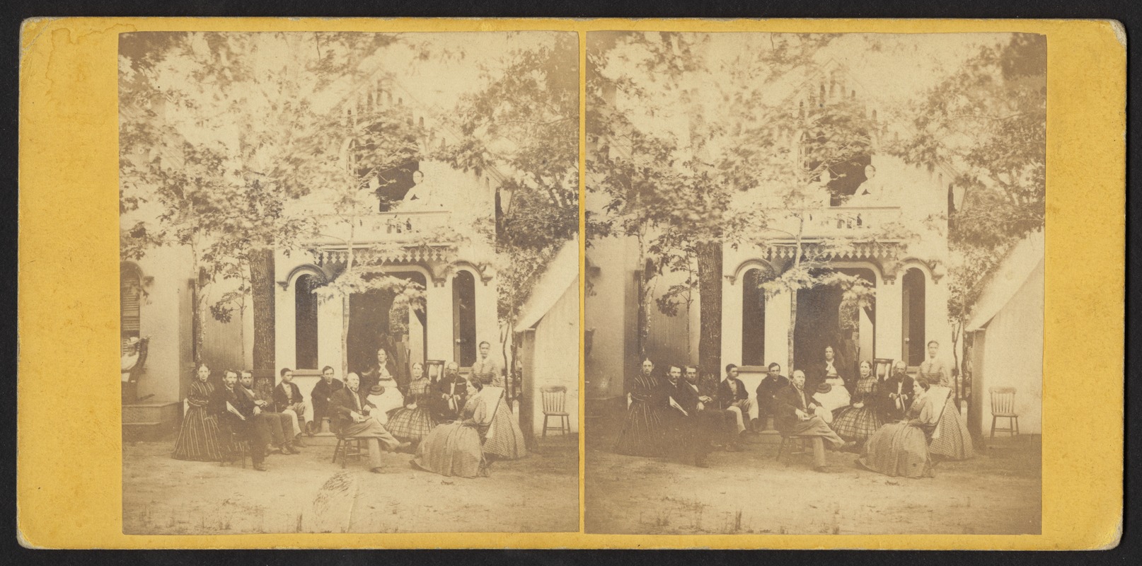 Group of people pose for photograph outside of a cottage on Martha's Vineyard