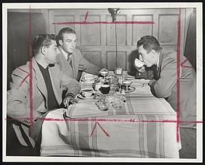 Cubs’ Sluggers Relax as rain forced postponement of series opener with Braves. Enjoying dinner at Hotel Kenmore are (left to right) Bill Serena, Frankie Baumholtz and Hank Sauer, the latter tied for home run lead with Brooklyn’s Andy Pafko.