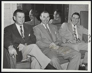 Tigers From Detroit take it easy in the Hotel Kenmore lobby before showing their teeth to Red Sox at Fenway Park today. Left to right are Gerry Priddy, Steve Souchock and Bob Swift.