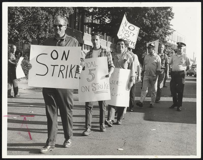 Workers in Marine shipbuilder's Local 5 picket General Dynamics in Quincy. They are striking against lay-offs.