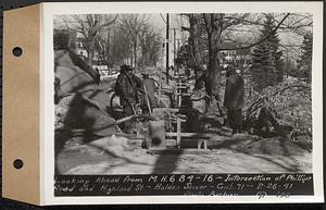 Contract No. 71, WPA Sewer Construction, Holden, looking ahead from manhole 6B4-16, intersection of Phillips Road and Highland Street, Holden Sewer, Holden, Mass., Feb. 26, 1941