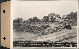 Contract No. 99, Enlargement of Fells High Level Distribution Reservoir, Stoneham, Malden, Melrose, looking west from Sta. 23+40+/- showing borrow pit, west side of basin 2, enlargement of Fells Reservoir, Stoneham, Mass., Jun. 8, 1940