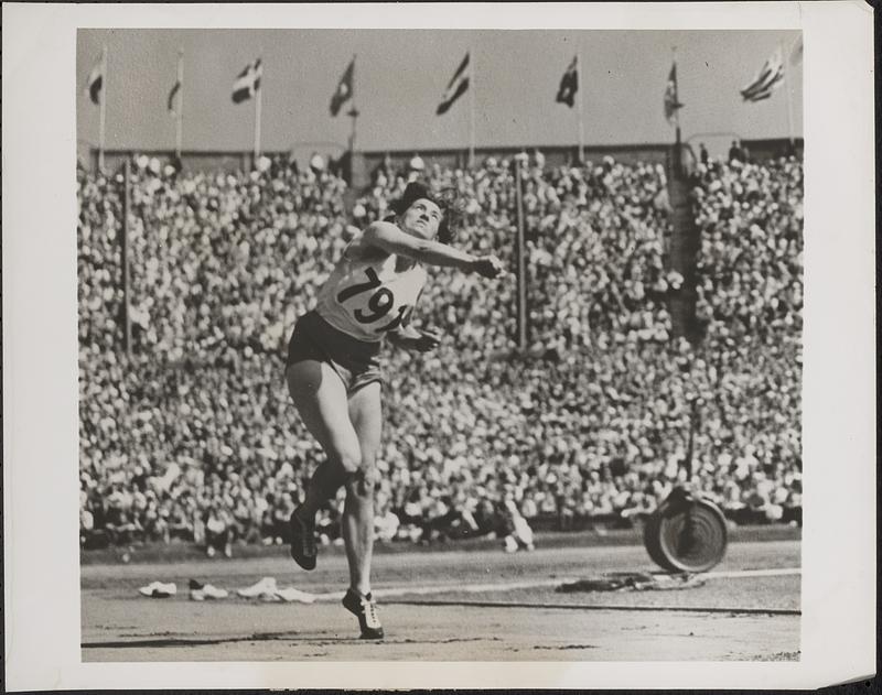 Sets new Olympic record in women's javelin throw
