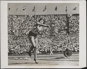 Sets new Olympic record in women's javelin throw