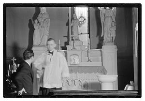 Baptism, Jesús Sanromá with priest
