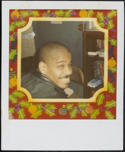 Mustached man smiling with a winter-themed border