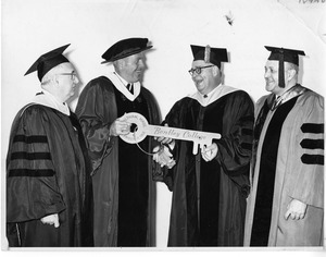 President Thomas Morison with "key" to Bentley College