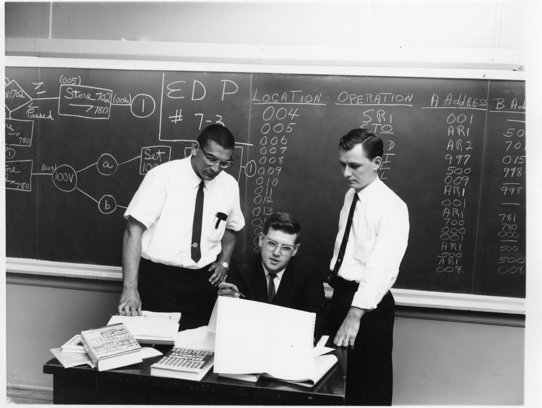 Professor Ed Wondolowski with students studying early automatic computers
