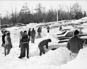 Students dig cars out of snow in parking lot during Blizzard of '78