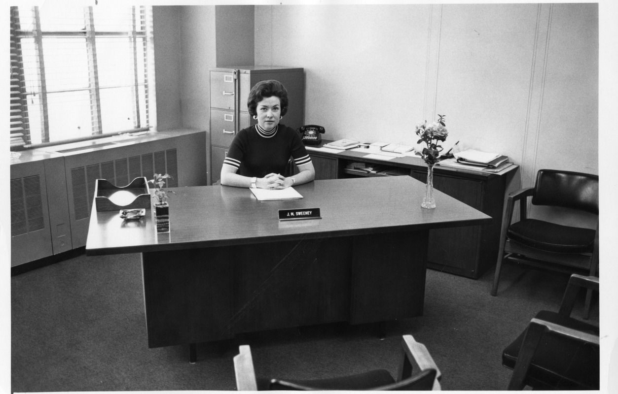 J.M. Sweeney at her desk in 1975