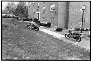Motorcycles parked outside of Bentley dormitory