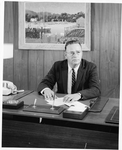 President Thomas Morison at his desk