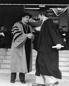 President Gregory Adamian and student at 1976 Commencement