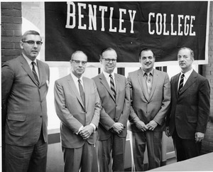 President Gregory Adamian and [?] gathered for Bentley College event