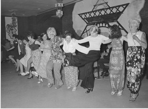 People dancing at event