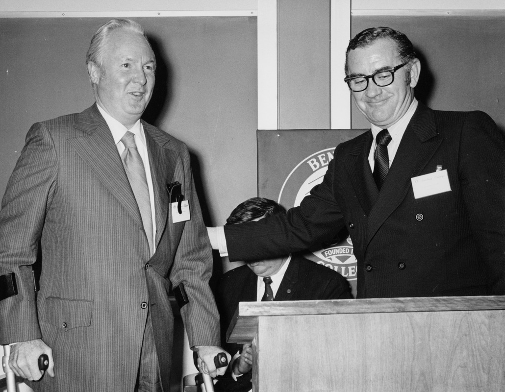 Boston Mayor John Collins and Waltham Mayor Arthur J. Clark at podium during event