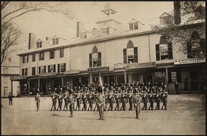 Claflin guards in front of old Nonantum House. Shops: Stiles & Co., stoves & furnaces. H. N. Gleason, grocer. Atwood & Eaton, Elliot Market. Richardson's Boston Express. Joseph M. Briggs, house & sign painter. B. S. Wetherbee, upholsterer. Newton Corner, Newton, MA