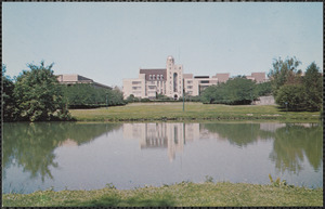 Topped by a meteorological tower and astronomical observatory dome, Davis Hall at Northern University in DeKalb overlooks a man-made lagoon that serves as a scenic setting for everything from weddings to rock concerts