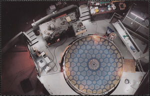 Seen from above after its old film of aluminum has been removed, Palomar Observatory's 200" Hale telescope mirror shows its internal honeycomb-like structure
