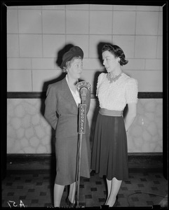 Ruth Moss and an unidentified woman at WAAB Colonial Network microphone