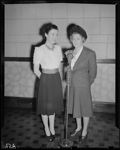 Ruth Moss and an unidentified woman at WAAB Colonial Network microphone