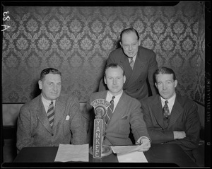 Jim Britt and three unidentified men at WNAC microphone