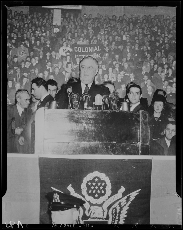 Montage of Franklin Roosevelt speaking from podium and a crowd holding a Colonial Network banner