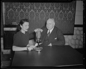Ruth Moss and unidentified man at WAAB microphone