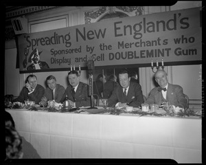 Jim Britt, Charlie O'Rourke, Linus Travers, and two unidentified men on the dais at Spreading New England's Fame banquet