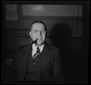 Unidentified man with pipe