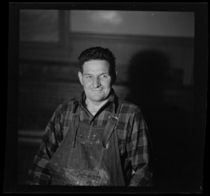 Unidentified man in overalls