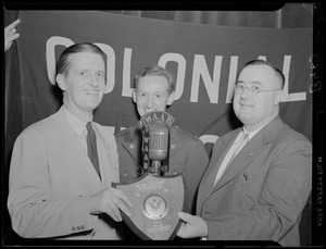 Presentation of plaque to Yankee-Colonial Network representative by Our Army magazine representative at Fort Devens