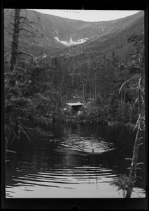 Lakeside mountain cabin, possibly at Mount Washington