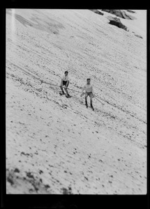 Downhill skiers, possibly at Mount Washington
