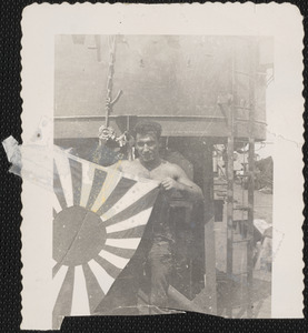 Japanese flag held by carpenter's mate third class Giacomo Leno Rosario